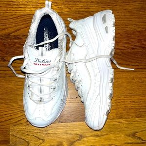 White sketcher with silver trim